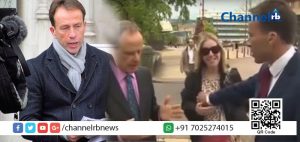 Read more about the article ലൈവ് റിപ്പോര്‍ട്ടിങ്ങിനിടെ ഫ്രെയിമില്‍ കയറി വന്ന യുവതിയുടെ ശരീരത്തില്‍ കയറി പിടിച്ച് ബി.ബി.സി റിപ്പോര്‍ട്ടര്‍: അപ്രതീക്ഷിതമായി ഉണ്ടായ സംഭവത്തില്‍ പകച്ചുപോയ യുവതി ചെയ്തത്..? വീഡിയോ വൈറലായപ്പോള്‍ വെള്ളം കുടിച്ച് റിപ്പോര്‍ട്ടറും.