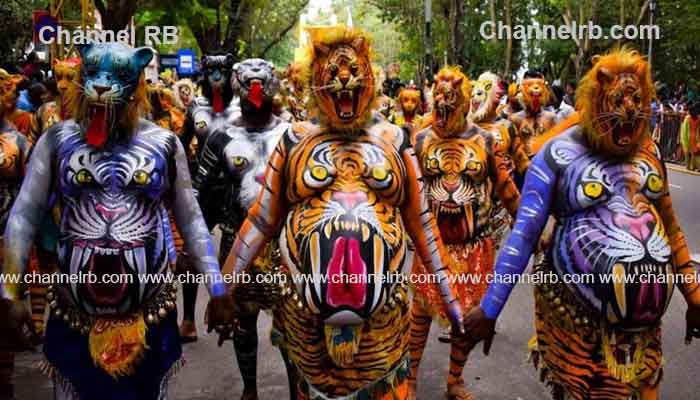 You are currently viewing പുലികള്‍ അണിനിരന്ന് തൃശൂര്‍ നഗരം; വന്യതാളത്തിൽ ചിലമ്പണിഞ്ഞ് പുലികൾ നഗര വീഥികളിൽ നൃത്തം വെച്ചതോടെ ജനക്കൂട്ടവും പുലിയാരവങ്ങളിൽ മുങ്ങി